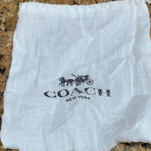 Authentic brand new smaller size Coach New York linen dust bag with Coach logo.